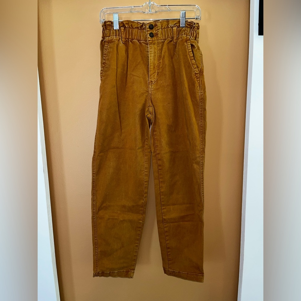 Brown high waisted khaki pants.